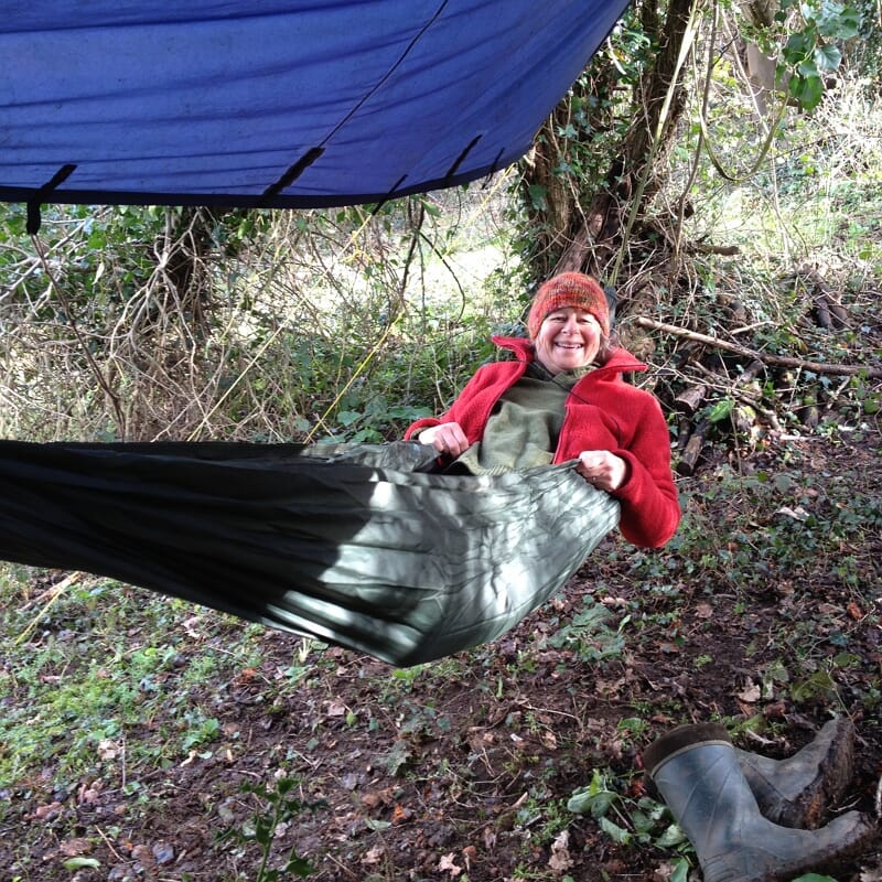 Kesty in a hammock in the woods